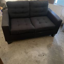 Black two person loveseat 
