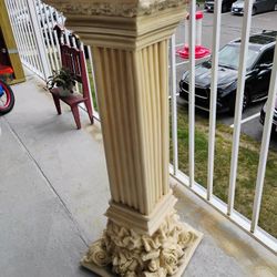 BEAUTIFUL COLUMN PLANT STAND CHERUBS ON BOTTOM/NOT CONCRETE BUT ITS HEAVY/ ONE SMALL PIECE AT THE BOTTOM NEEDS TO BE GLUED OTHERWISE GREAT CONDITION 