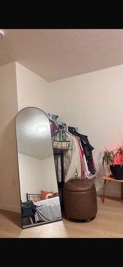 full size mirror, ottoman, couch and coffee table