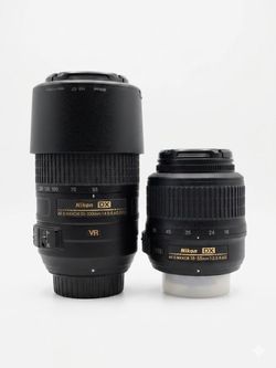 Nikon D5100 DSLR Camera Bundle - 3 VR Lenses (18-55mm, 55-200mm, 55-300mm) + Charger