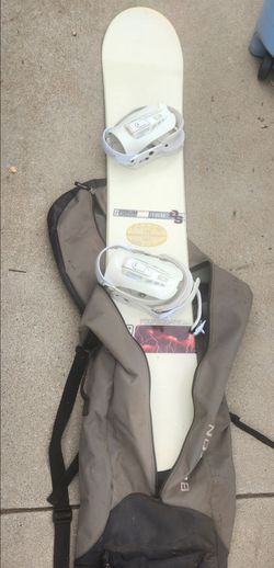 Forum Snowboard with bindings and Burton carry bag