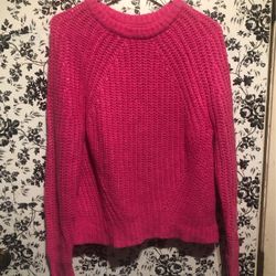 Pink knitted sweater
