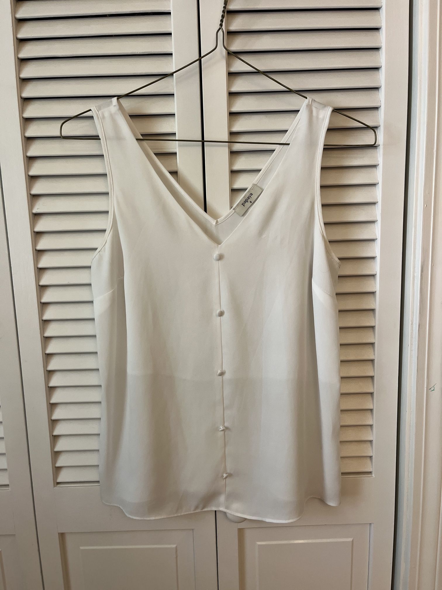 white sleeveless top