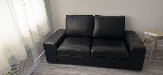 Black leather IKEA sofa