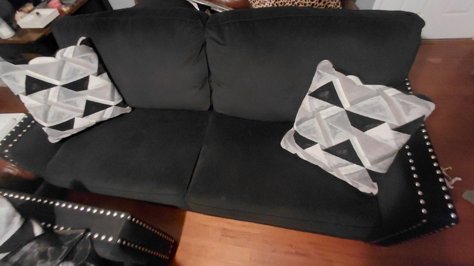 Black suede couch and love seat. Very nice