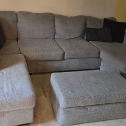 Gray Couch, And  Ottoman 