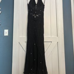 Evening gown/prom dress/cocktail dress never worn absolutely stunning! Can be mother of the bride dress. Size 8 fits amazing!