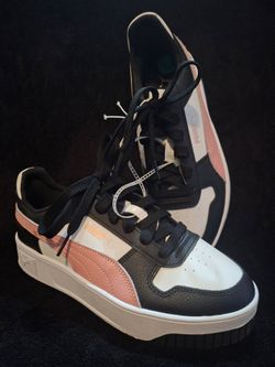 White, black, and rose dust colorway featuring a platform sole