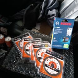 New Bosch green lazer & (5) ridgid 4.5" diamond blades