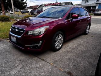 2015 Subaru Impreza 2.0i Premium AWD – $6,000