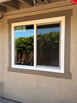 White Vinyl Sliding Window with Screen
