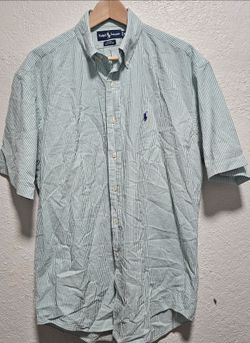 Ralph Lauren Blake short-sleeve shirt in a green and white striped seersucker fabric.Brand: Polo Ralph LaurenStyle: Blake button-downMaterial: 100% co