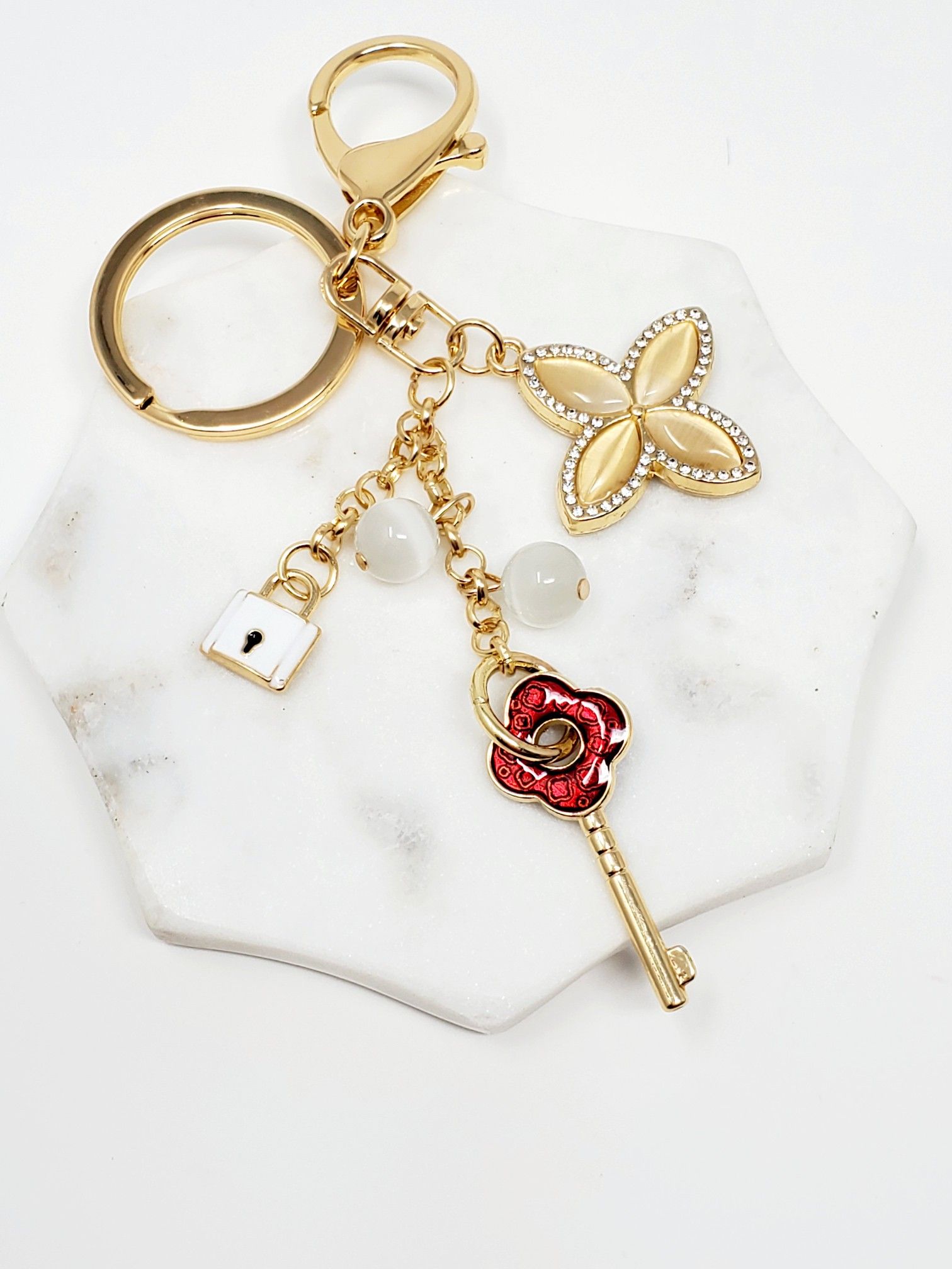 Bling keychain bagcharm with red key, clover, lock charm
