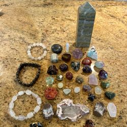 Assorted Crystals including a Large Tower, 3 Bracelets, Carvings, Merkaba, Tumbles, Palm Stone, Thunder Egg Geode
