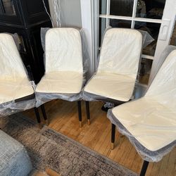 Four Leather Chairs