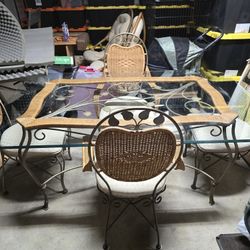 Beautiful Glass, Rattan and Wrought Iron Dining Table with 4 Chairs