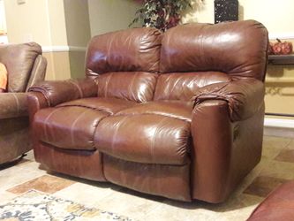 Brown leather loveseat recliner