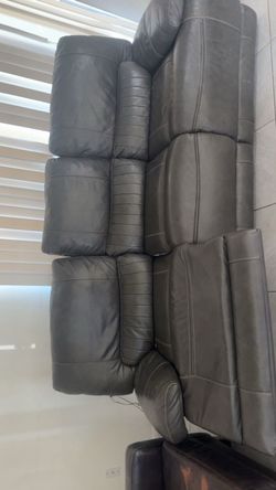 Gray Leather Reclining Sofa
