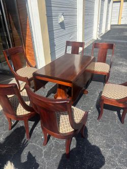 Solid  oak wood dining table with six chairs QW Amish Ashley  double pedestal base and drop leaf.. 48 “ wide, 44" depth , 30 “ high … $750 Delivery av