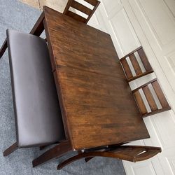 6-PC BROWN FINISH DINING SET (TABLE WITH EXTENSION LEAF, LARGE WIDE BENCH AND 4 WIDE PADDED SEAT CHAIRS)