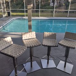 (4) FLOYD GAS LIFT SWIVEL BARSTOOLS  -  MODERN BONDED  - LEATHER SEATS, ADJUSTABLE HEIGHT & 360 DEGREE COMFORT FUNCTIONALITY.