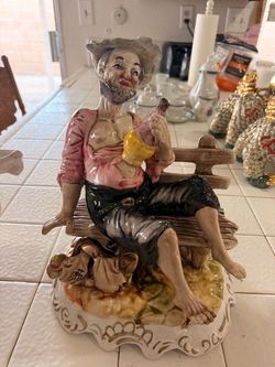 Genuine Italian Hobo On Bench Porcelain Figurine