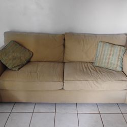 Tan Sofa and Loveseat