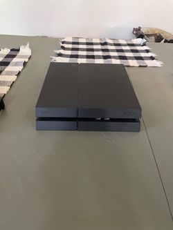PlayStation 4 with two controller