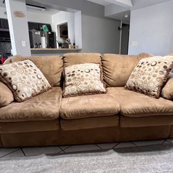 Tan Microfiber Sofa with Three Accent Pillows