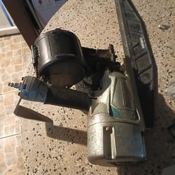 nail gun in a ladder 