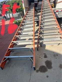 Escalera de 16. pies, de doble subida de fibra de vidrio, casi nuevas muy barata