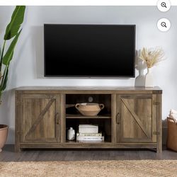 Brand new tv stand , in box never opened