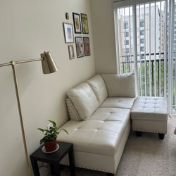 White Leather Couch (one side of an L-shaped couch) + Ottoman