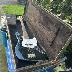 Fender squier bass, hard case,f ender rumble 15 amp and stand - good shape.  Would make a great Christmas gift for the young aspiring musician without