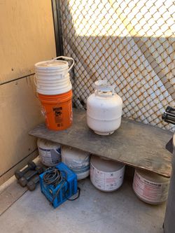 A bunch of empty propane tanks