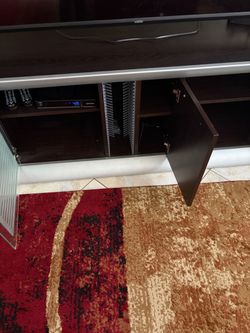 Dark Wood TV Stand with Cabinet Doors