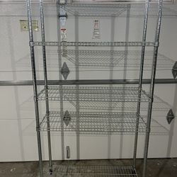 Metal Storage Shelving. Height: 70”- Wide : 36”- Depth: 14”