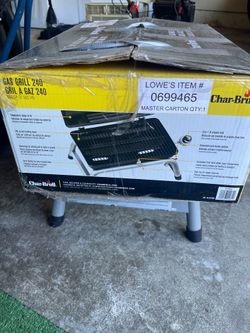 Unopened charbroil brand propane grill .