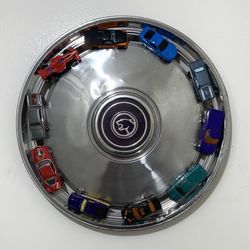 Vintage Hubcap with Toy Cars Wall Art