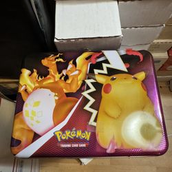 2 Pokemon Lunchboxes Full of items (I know nothing of), came in a big trading card purchase I made. Make me an offer for both of them. 