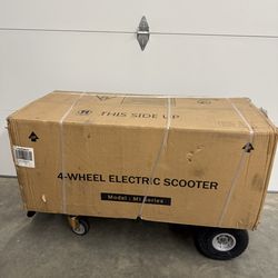 Flynama Four Wheels Compact Travel Mobility Scooter with 300w Motor- Chrome Model #L-P198329  $1655 plus tax at Lowe's website new still in the box