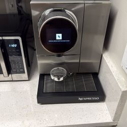 Nespresso Momento 100 