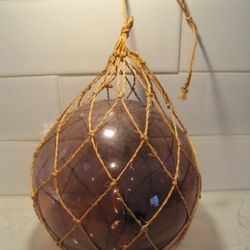 1970's era Vintage Decorative Light Purple Glass Float in Net

