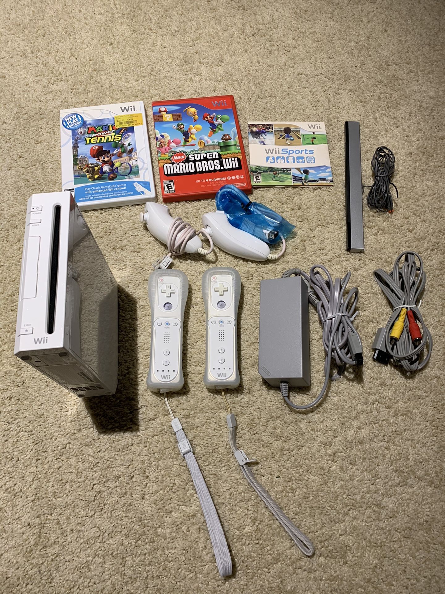 Nintendo Wii with Super Mario Bros, Mario Tennis and Wii Sports