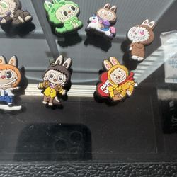 LAbubu croc charms seven included in the bundle