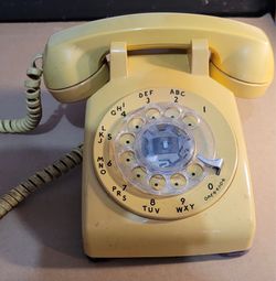 Yellow Vintage Phone With Rotary Dial
