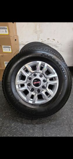 17" GMC OEM Factory rims w/ Firestone tires. Like new