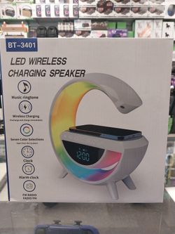 Altavoz LED con carga inalámbrica para iPhone y Samsung, reproductor auxiliar + radio FM