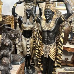 Pair Monumental Egyptian Revival Black & Gilt Pharaoh Floor Sculptures 6ft Holding Lotus Bowls