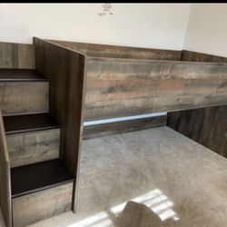 Youth twin bed with storage steps and play area underneath/comes with my mattress 